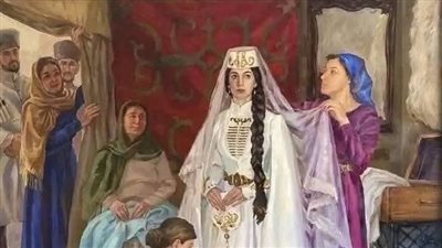 في احدي القري الصيفية تجلس امراءة مع زوجها