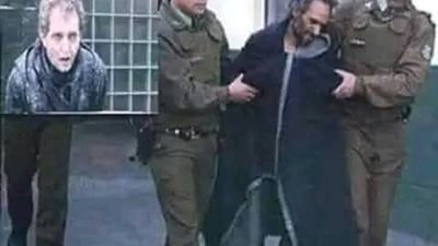 لصورة لعامل كان يعمل في مصنع لتجميد الأسماك واللحوم